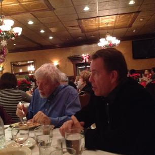 Billy and Frank enjoying a bite to eat at a friend's party in 2015